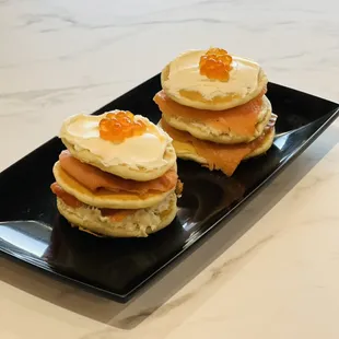 Our signature short stake pancakes... Lox and whitefish salad on mini pancakes