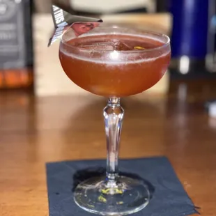 a cocktail in a coupe glass