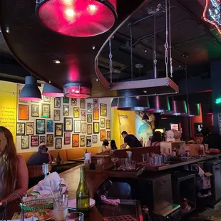 a woman sitting at a bar