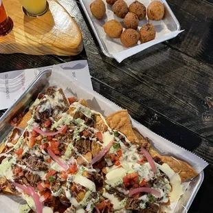 Brisket nachos and side of hush puppies