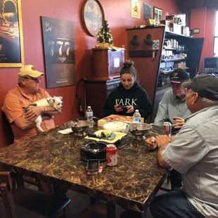 Customers enjoying cigars in the store
