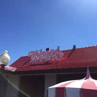 Outdoor seating where I watched 30 people take a pic of this sign