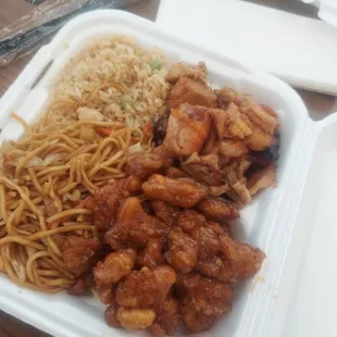 Half rice and half noodles with bourbon and orange chicken