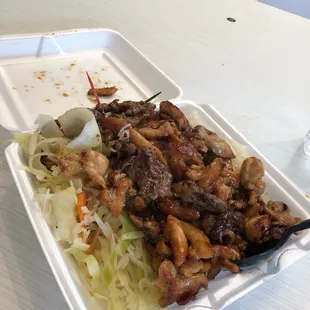 Chicken Teriyaki with addl beef over white rice and vegetables.