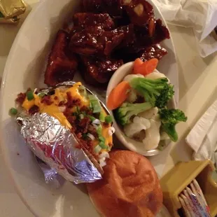 Rib tips with baked potato and veggies