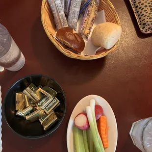 Rolls and radish/carrot/celery/green onion plate