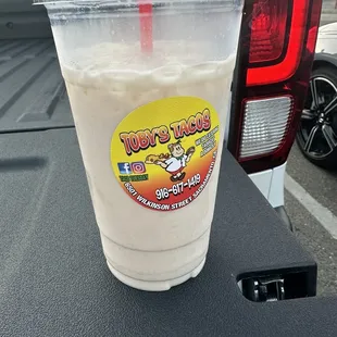 a drink in a plastic cup