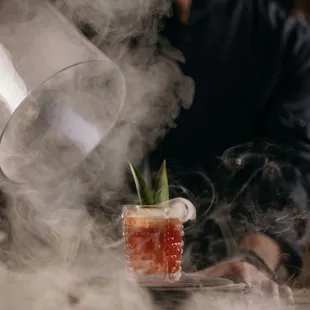 El Papasito- El Silencio Espadin, pineapple gomme, campari, Montenegro Amaro.