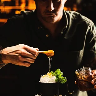 Winnie De Pooh- Chamomile infused Casamigos Blanco, green chartreuse, mint, ginger, lemon, wildflower honey.