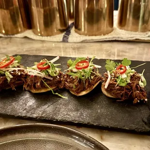 Short Rib Tostadas. Comes with 5 but I ate 1 before the picture. Unbelievably delicious.