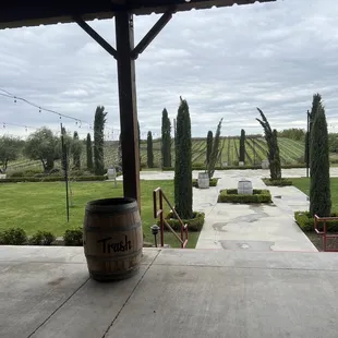 a barrel of wine on a patio