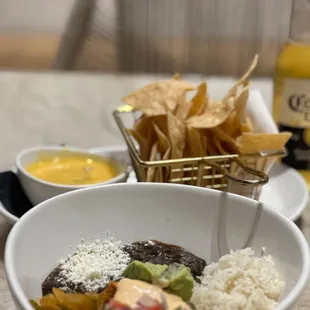 a bowl of mexican food