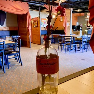 The booths are like personal cabanas, with great artwork and little touches like the fresh flowers on the tables