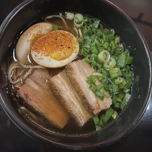 a bowl of ramen and an egg