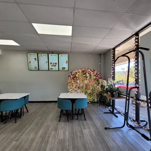 a room with tables and chairs