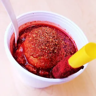 Diablito: Limon Sorbet topped with Chamoy Sauce and Chili Powder, served with Tamarindo stick.