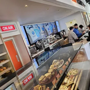 customers waiting for their order at the counter