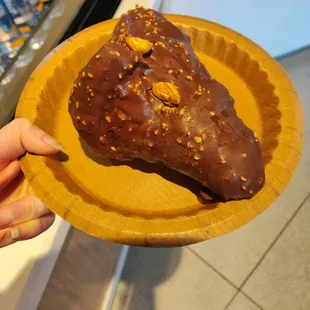 Chocolate dipped hazelnut creme filled croissant. $5.10 after tax. Very good!! I miss it...