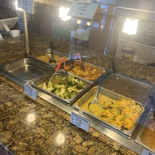 Broccoli, Shrimp Fried Rice, Cheese Broccoli(?) Gumbo(?) other item unknown