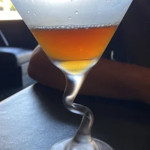 a drink in a martini glass