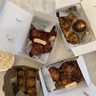 three boxes of food on a table