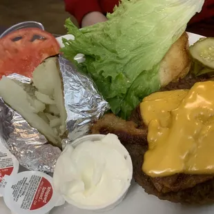 Bacon cheeseburger with baked potato