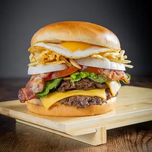  bacon cheeseburger on a wooden board