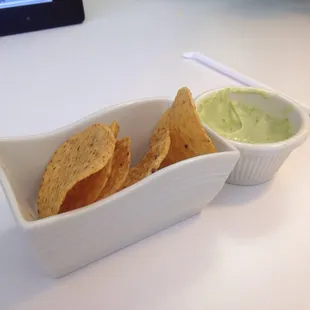 Chips and some kind of garlic/cilantro/mayo/sour cream dip to munch on.