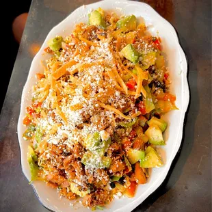SOUTHWEST SALAD/ Chicken  romaine, pico de gallo, corn, black beans, avocado, cotija cheese, tortilla strips &amp; chili lime vinaigrette