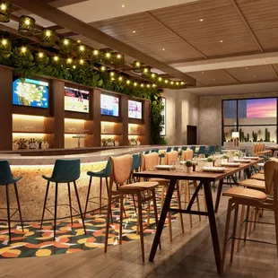 the interior of a restaurant with a bar and seating
