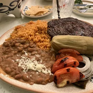 Steak Picado with Sweet Corn Tamal  Tomato rice and refried beans