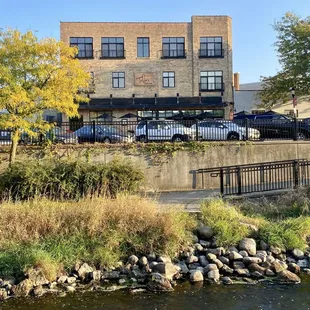 Park at the bank after 6pm and walk over the love bridge to the restaurant.