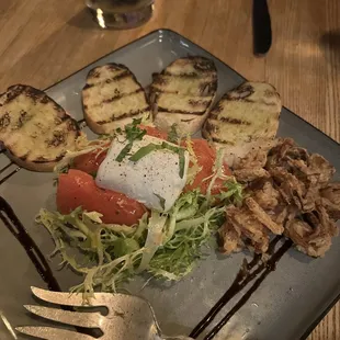 ROASTED TOMATO &amp; BURRATA - burrata, roasted tomatoes, frisee, fresh basil, fried shallots, balsamic glaze, grilled baguette.