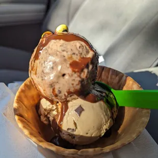 Small - salty caramel fudge truffle on top and caramel espresso chip on bottom with hot fudge in waffle bowl.  Cute googley eyes too.