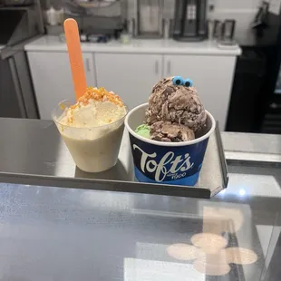 Orange creamsicle sundae and scoop of moose tracks and mint chocolate chip