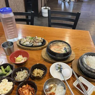 Seafood tofu soup with grilled pork belly. I love their banchan.