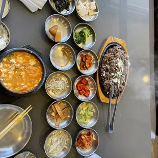 Seafood-beef tofu soup, bulgogi, and lots of side dishes!