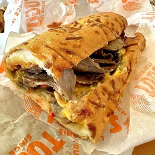 Cheese steak sandwich with jalapeños