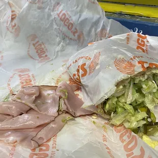 4 slices of ham for large size sandwich. Staff told me it's the same amount used in regular sandwiches...