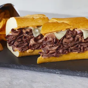 a roast beef sandwich and chips
