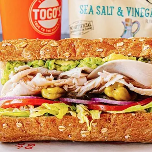 a sandwich with meat and vegetables