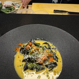 Squid ink pasta with uni