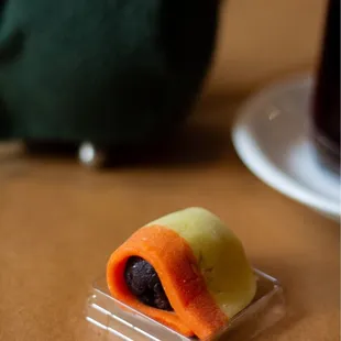 a small piece of food on a table