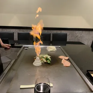 a flame coming out of the grill
