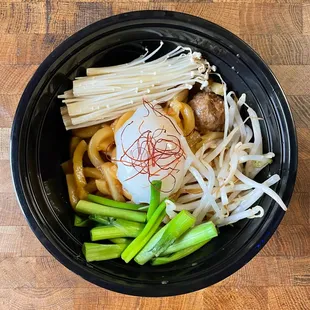 Claypot Choriudon *NEW* udon noodles baked in a donate with Japanese style chorizo, soft egg, scallions, enoki, bean sprouts and dash-butter