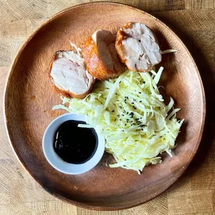 chicken roulade - steamed and then fried crispy chicken thigh served with Japanese slaw and eel sauce (no eels harmed in the making;)