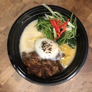 Toki classic tonkotsu as-served for takeout. Broth comes separately and can be reheated.