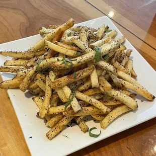 Purple Rain Fries: tossed in purple shiso seasoning and topped with fresh shiso leaf