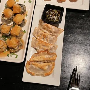 Spicy Tuna Crispy Rice, crab Rangoon Roll and Potstickers