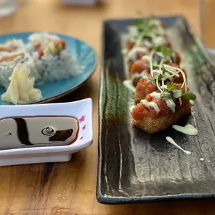 Crispy Spicy Tuna Roll with a regular Spicy Tuna Roll on the left.